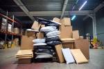 Empilement de colis dans un entrepôt (Crédit : Alex.I)