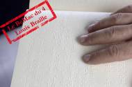 Journée mondiale du braille : lecture livre en braille